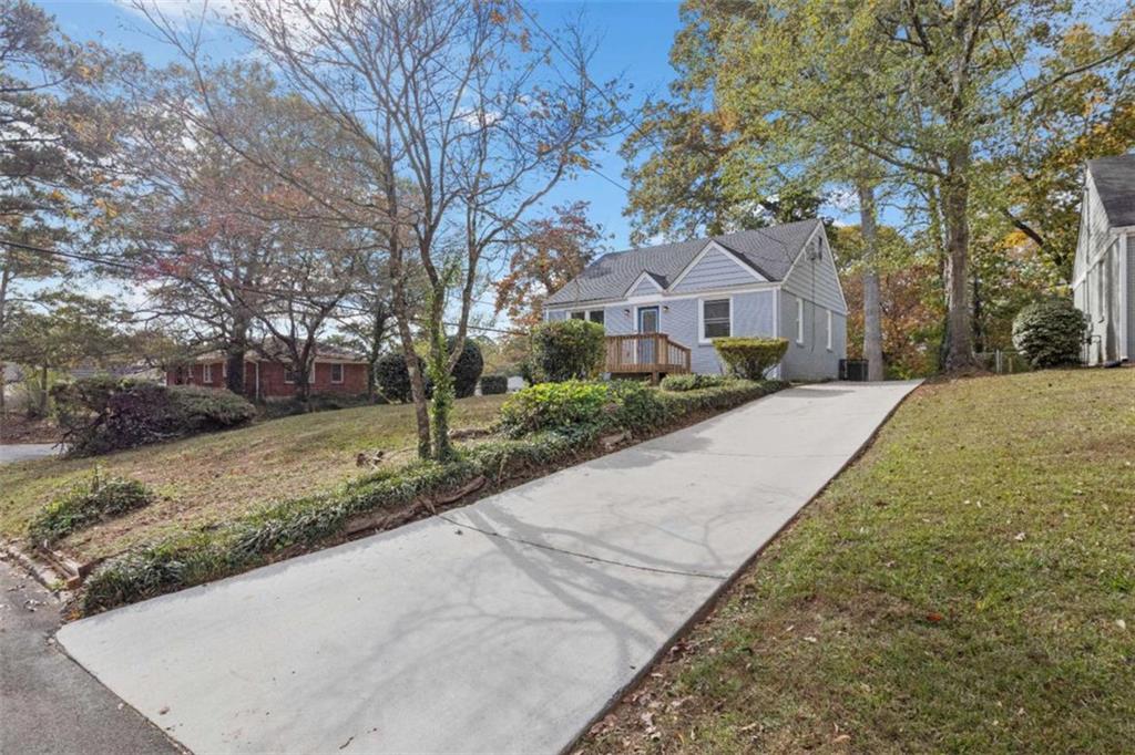 701 Daniel Avenue Decatur, GA 30032 - Photo 3 of 29 a front view of a house with a yard and trees