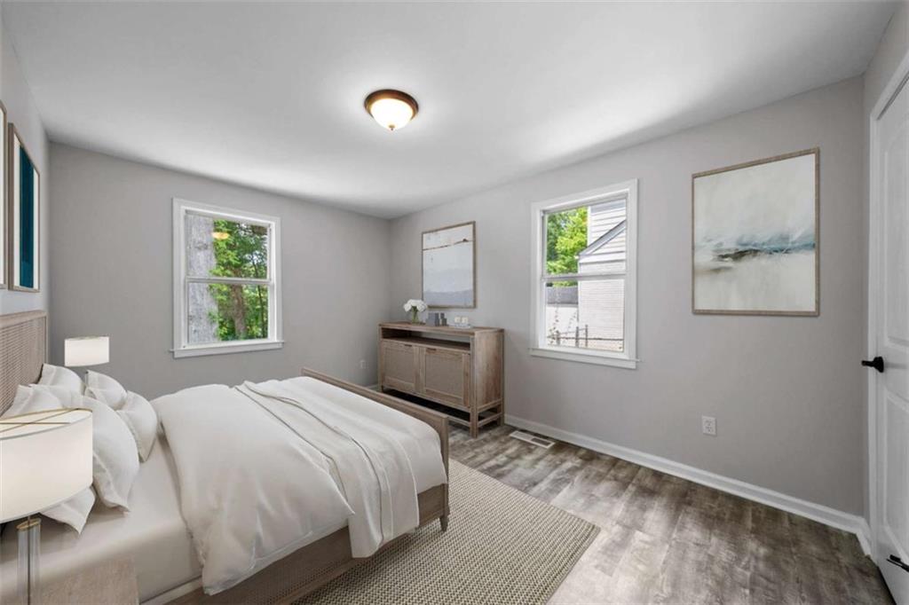701 Daniel Avenue Decatur, GA 30032 - Photo 7 of 29 a bedroom with a bed and a window
