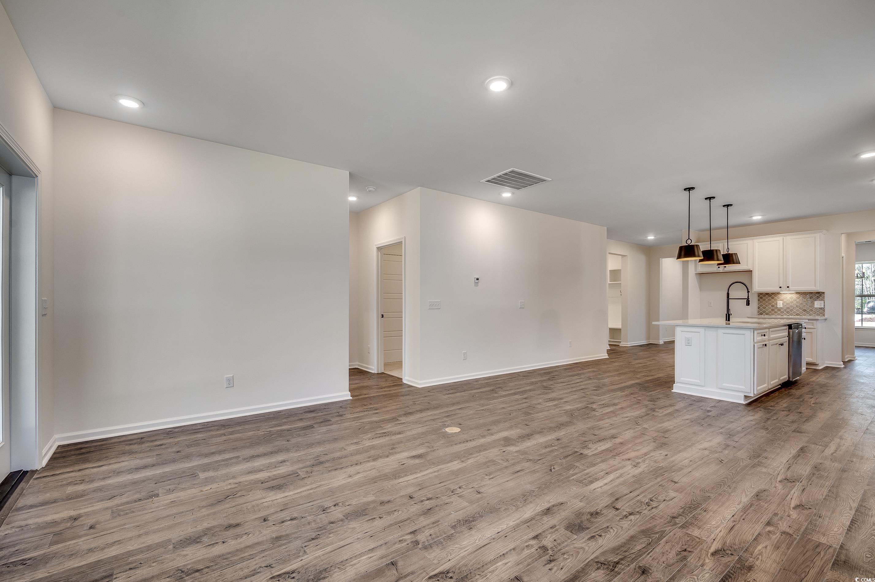 35 Northbrook Drive Murrells Inlet, SC 29576 - Photo 13 of 40 Generous great room open to the kitchen