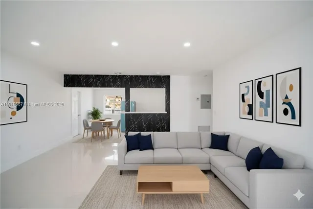 a living room with furniture and rug