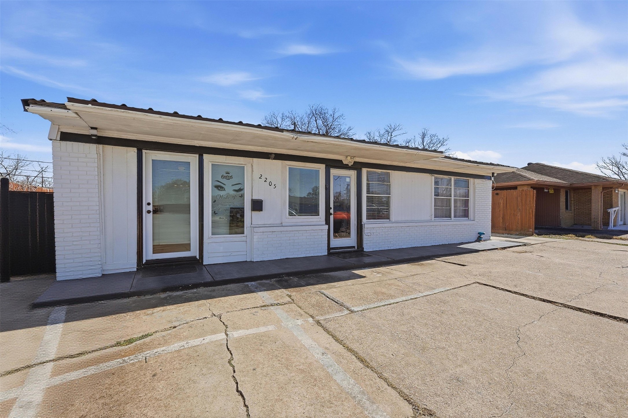2205 Strawberry Road Pasadena, TX 77502 - Photo 1 of 29 front view of a house with a large window