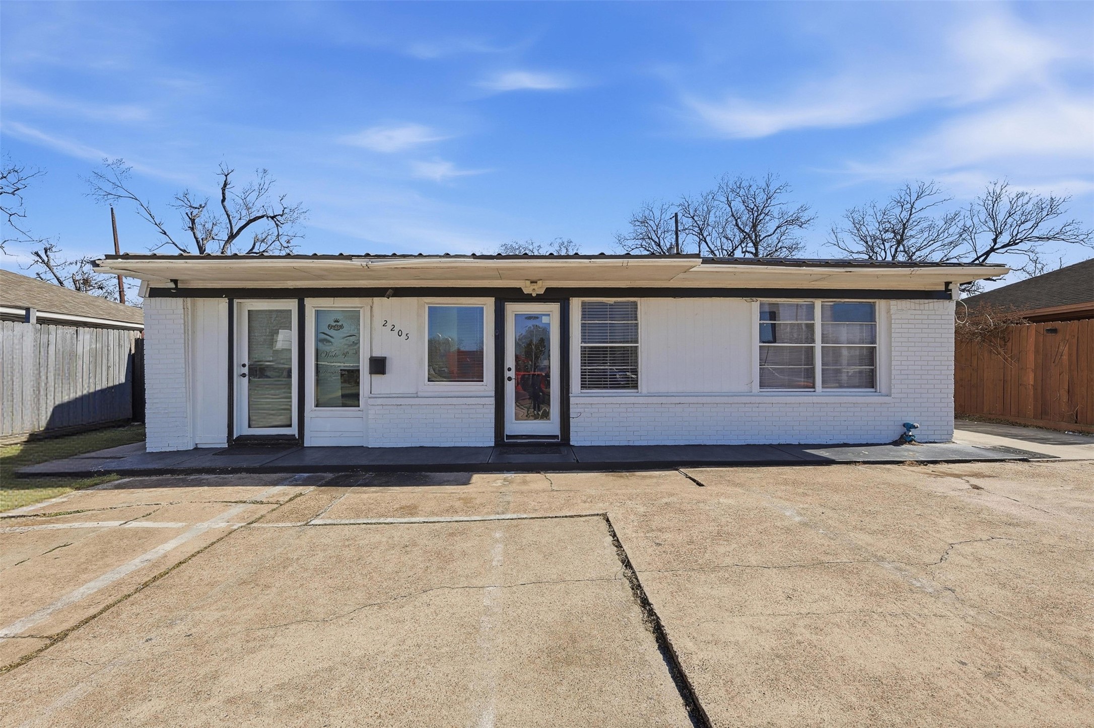 2205 Strawberry Road Pasadena, TX 77502 - Photo 2 of 29 a view of a house with a garden