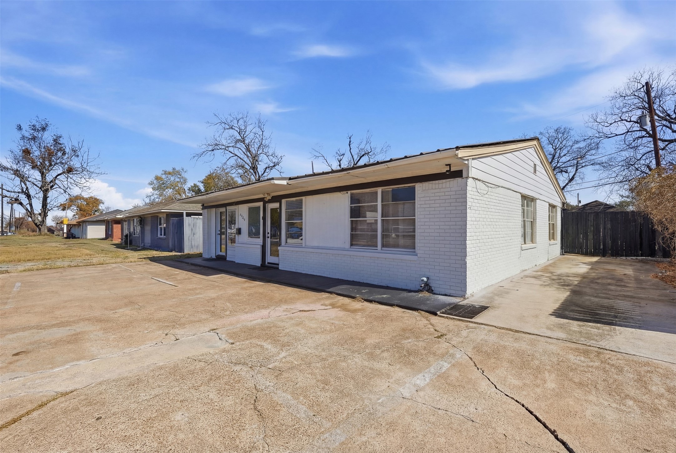 2205 Strawberry Road Pasadena, TX 77502 - Photo 3 of 29 a view of a house with a yard