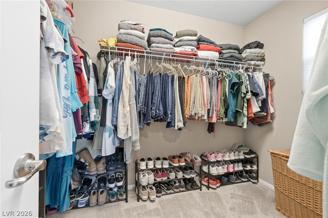 150 Fulgora Street Henderson, NV 89074 - Photo 50 of 92 Walk in closet with light carpet