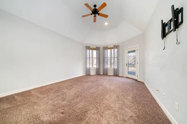 a aerial view of a house with a yard