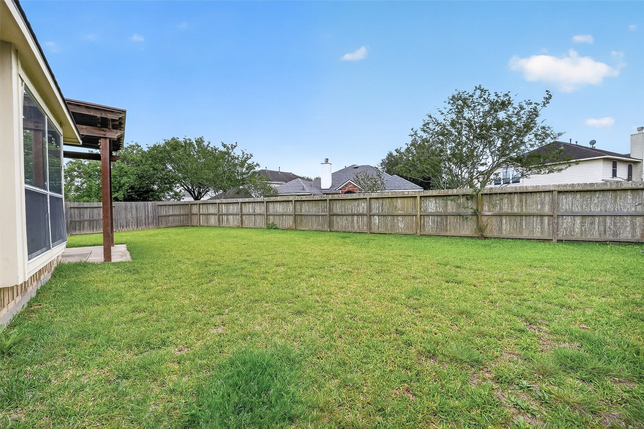 14308 Rocky Briar Lane Rosharon, TX 77583 - Photo 46 of 46 a view of a backyard with a garden and plants