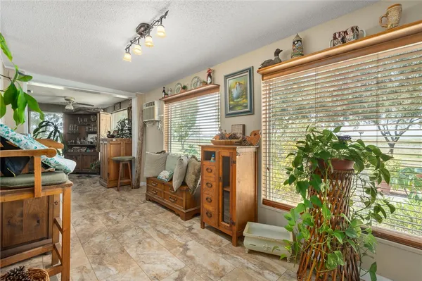 a view of a porch with seating space