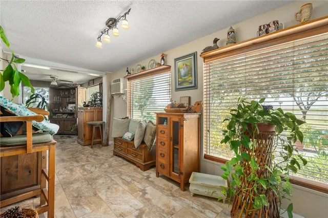 a view of a porch with seating space