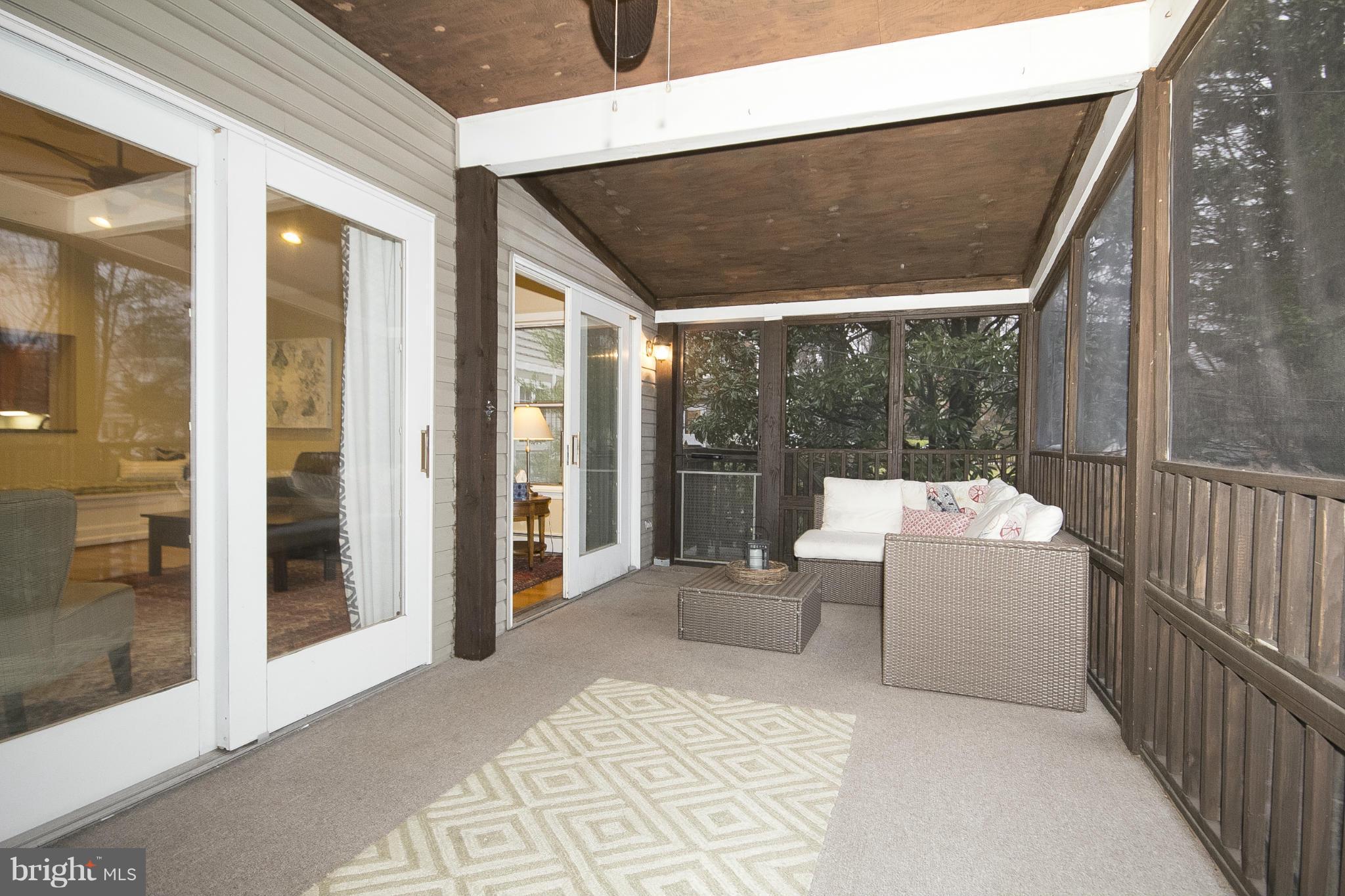 7104 Rich Hill Road Baltimore, MD 21212 - Photo 23 of 30 Screened porch with ceiling fan.