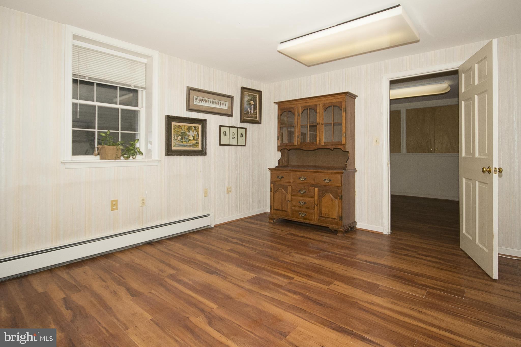 7104 Rich Hill Road Baltimore, MD 21212 - Photo 28 of 30 living room for in-law suite. Could be an office.