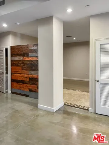 a kitchen with granite countertop a stove and a microwave