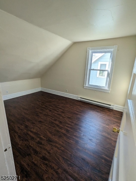 190 Chambers Street, Unit 2 Phillipsburg, NJ 08865 - Photo 8 of 10 an empty room with wooden floor and windows