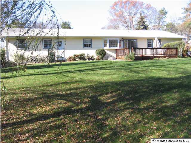 484 Bella Vista Road Brick, NJ 08724 - Photo 2 of 3 a front view of house with yard