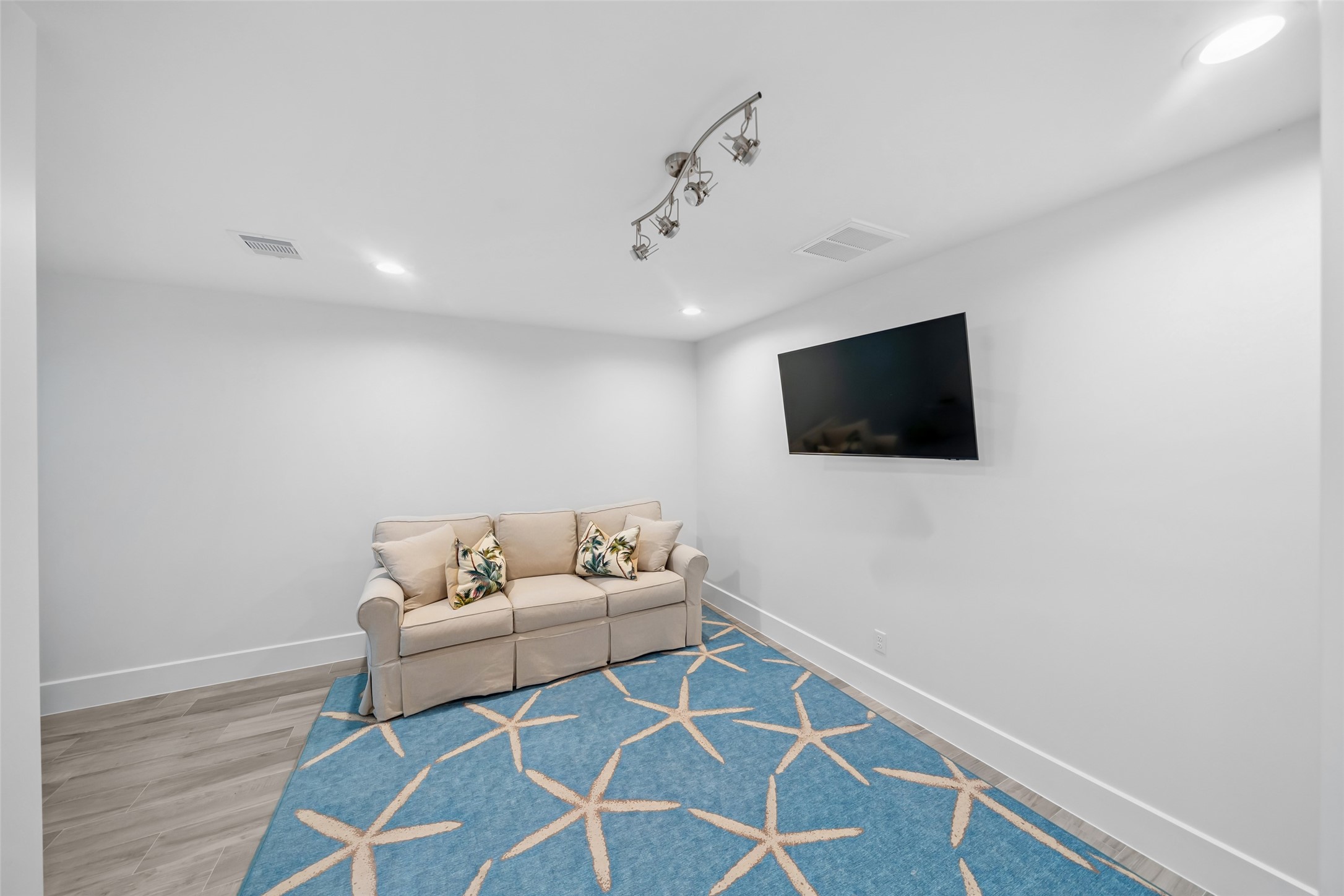 24118 Margerstadt Road Hockley, TX 77447 - Photo 34 of 50 This thoughtfully designed flex space features sleek tile flooring and custom lighting—directly connected to the upstairs walk-in closet, making it ideal for a playroom, hobby space, or private retreat.