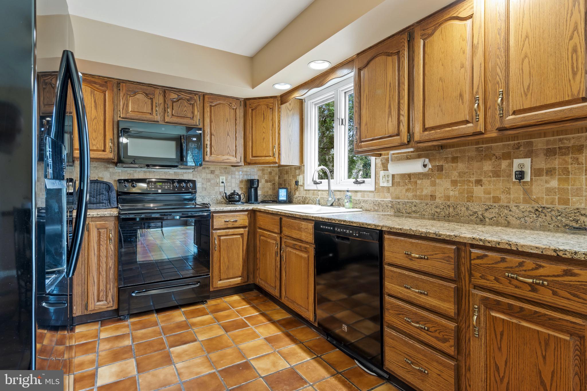 1 Derringdale Road Wayne, PA 19087 - Photo 24 of 41 Granite Counters, Tile Backsplash