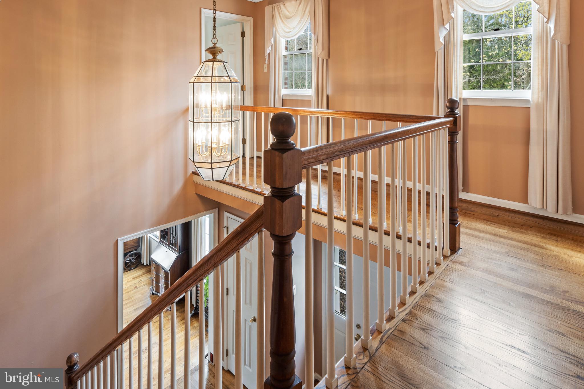 1 Derringdale Road Wayne, PA 19087 - Photo 39 of 41 Two-Story Staircase with Hardwood Floors