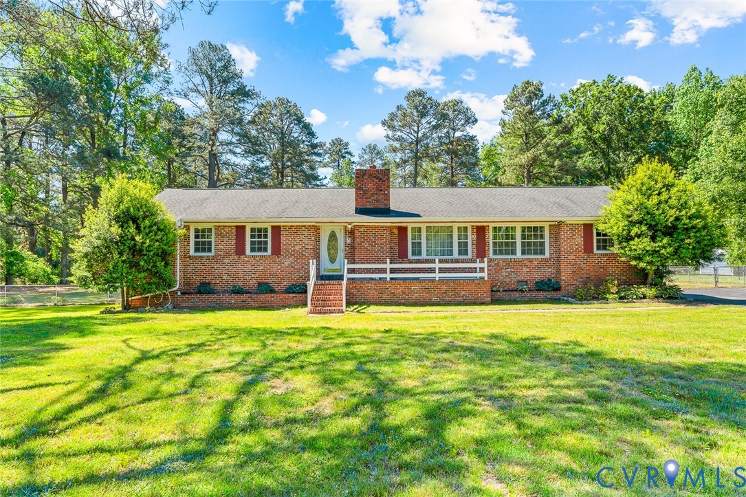 3815 Kingsland Road North Chesterfield, VA 23237 - Photo 1 of 40 a front view of a house with a yard
