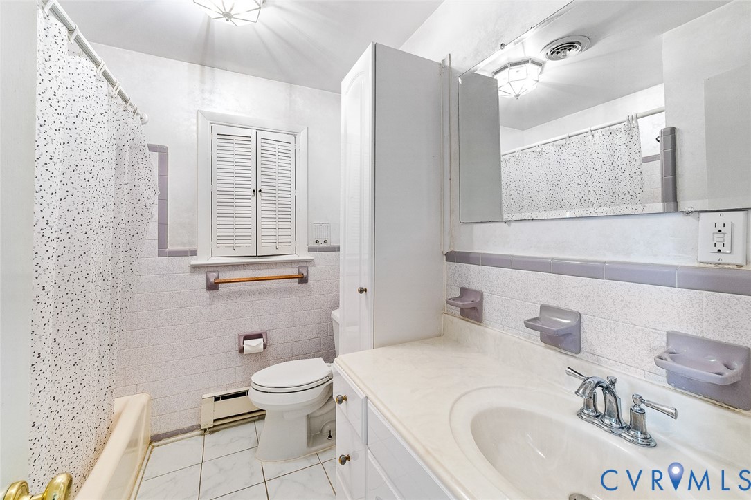 3815 Kingsland Road North Chesterfield, VA 23237 - Photo 19 of 40 a bathroom with a sink toilet and shower