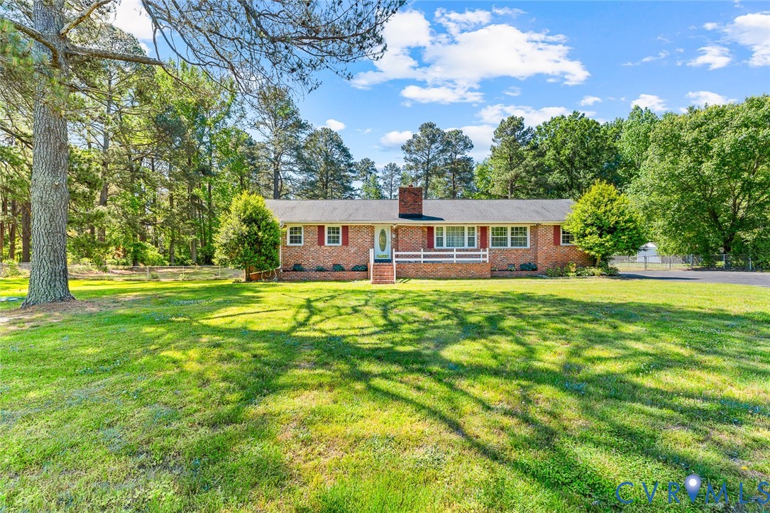 3815 Kingsland Road North Chesterfield, VA 23237 - Photo 2 of 40 a view of a house with a big yard