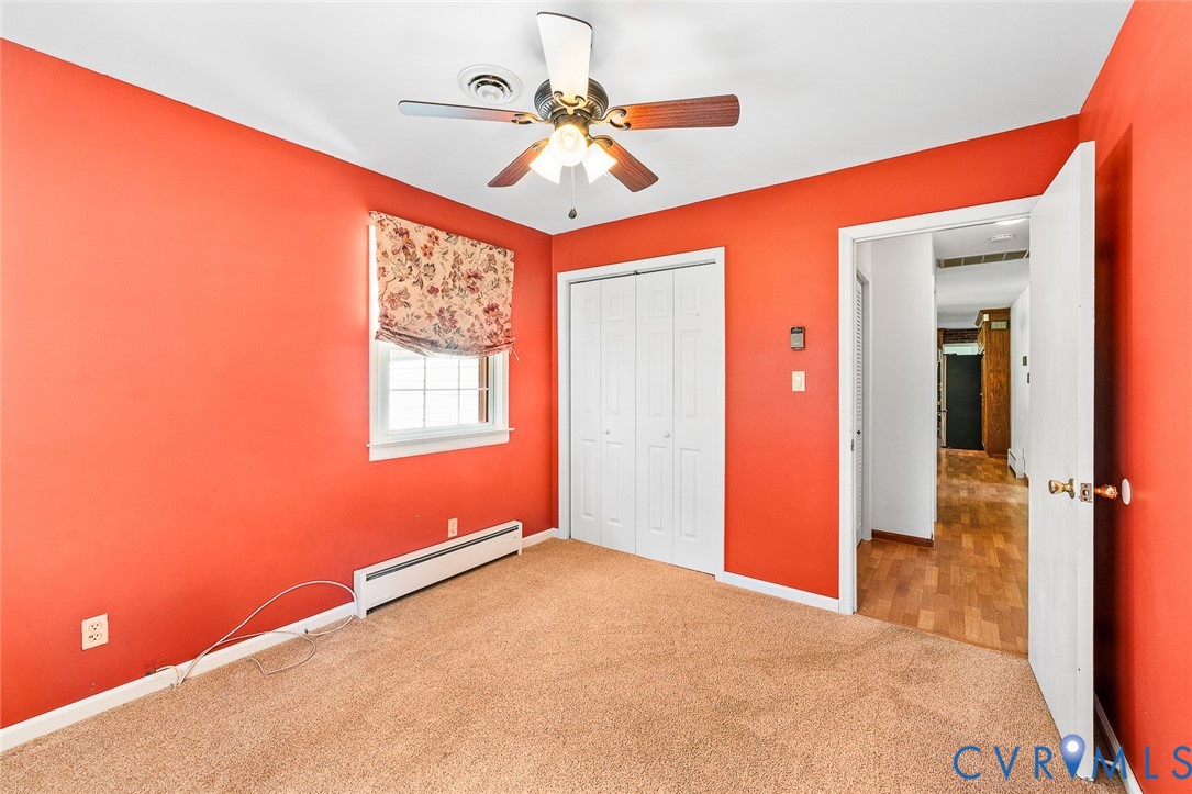 3815 Kingsland Road North Chesterfield, VA 23237 - Photo 21 of 40 a view of a livingroom with a ceiling fan and window