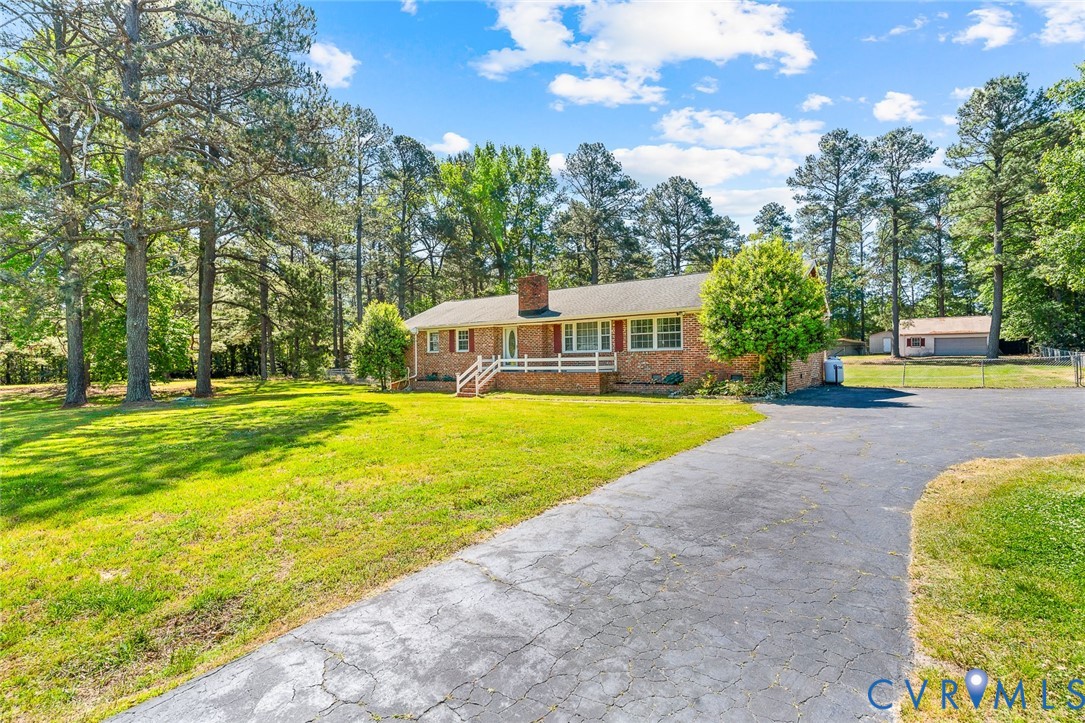 3815 Kingsland Road North Chesterfield, VA 23237 - Photo 3 of 40 a view of swimming pool with outdoor seating and yard