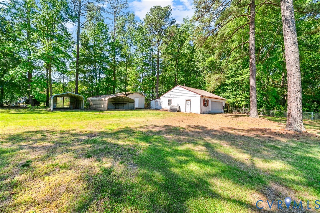 3815 Kingsland Road North Chesterfield, VA 23237 - Photo 33 of 40 a view of pool with tree in the background