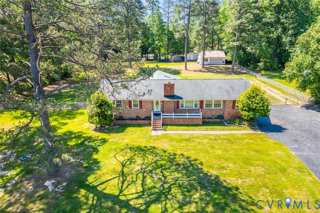 3815 Kingsland Road North Chesterfield, VA 23237 - Photo 36 of 40 a view of a swimming pool with an outdoor seating and yard