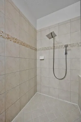 a bathroom with a glass shower