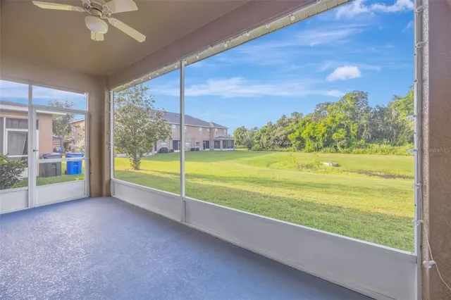 a view of a house with backyard and garden