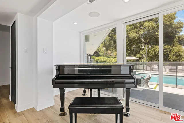 a view of a chairs and table in a room