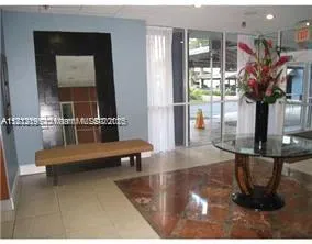 a room with pool side view