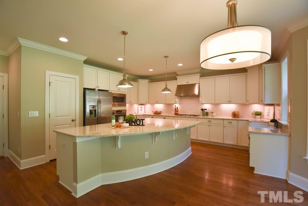 2008 Bowling Green Trail Raleigh, NC 27613 - Photo 9 of 30 The gorgeous Kitchen also features subway tile backsplash, recessed lights, walk-in Pantry, desk area & sunny Bfast area!