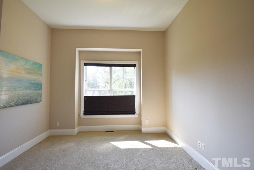 2008 Bowling Green Trail Raleigh, NC 27613 - Photo 15 of 30 Main level Guest Bedroom w/11’ ceiling, neutral carpet & lg closet has private full Bath w/tiled tub-shower & floor.