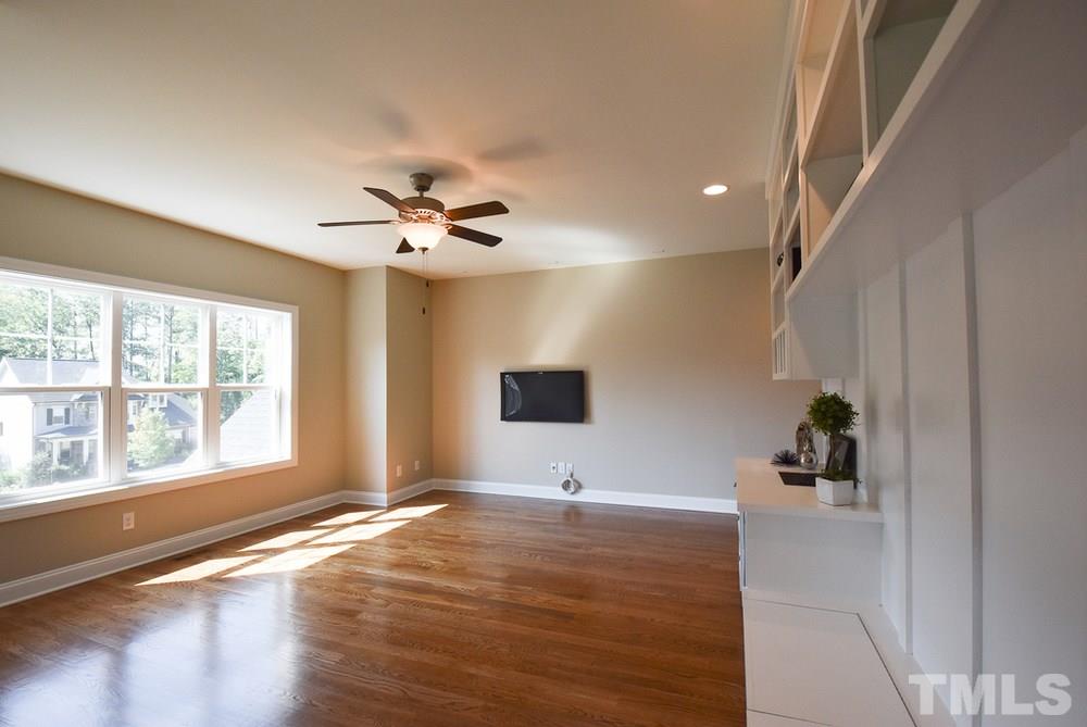 2008 Bowling Green Trail Raleigh, NC 27613 - Photo 16 of 30 2nd floor w/9’ smooth ceilings throughout. The lg open Bonus Rm offers a hardwood floor, lots of windows, CF & built-in desk/bookshelves/storage benches.