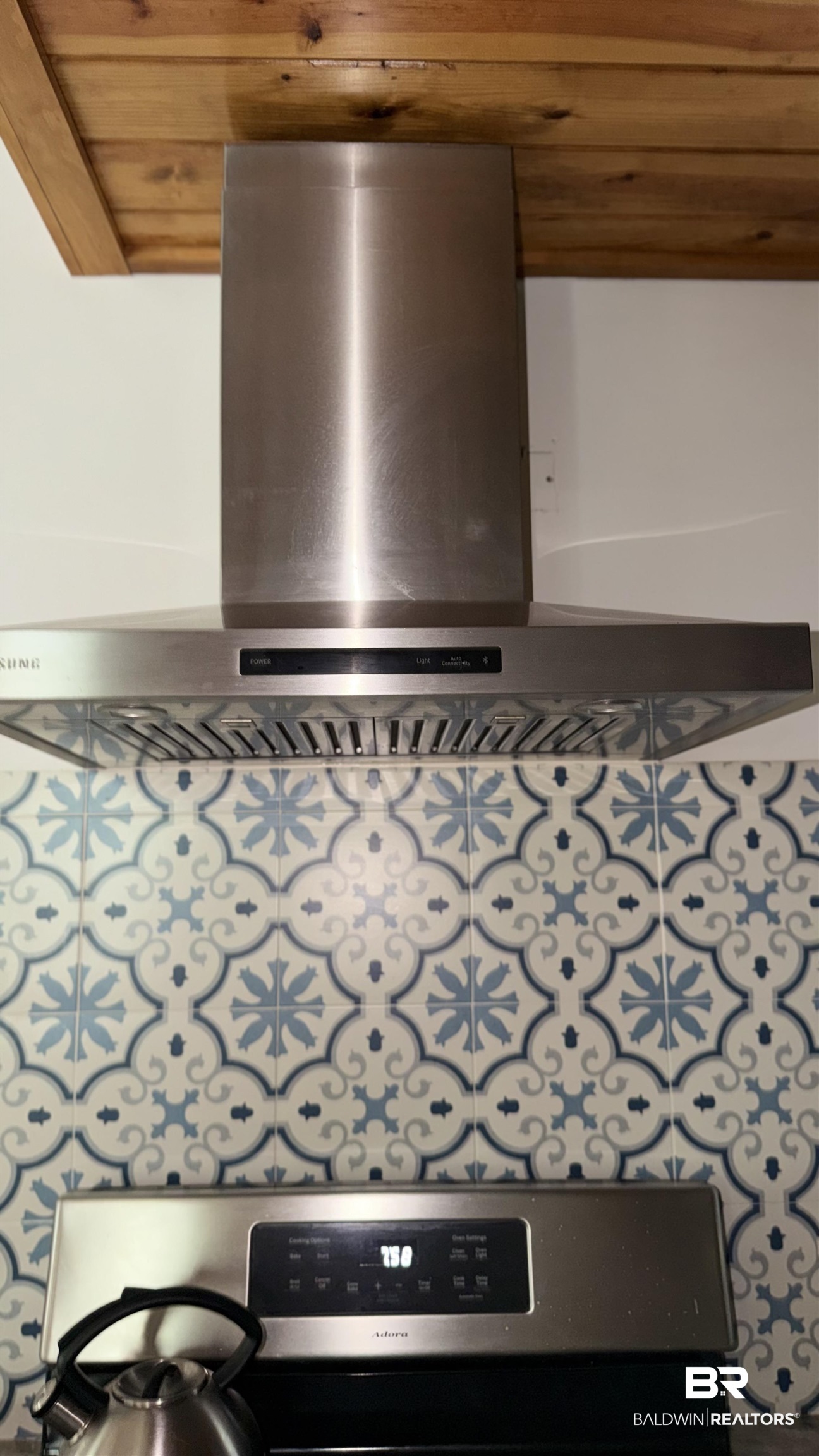 3983 Eureka Landing Road Uriah, AL 36480 - Photo 11 of 45 Kitchen view of range hood and stainless steel stove