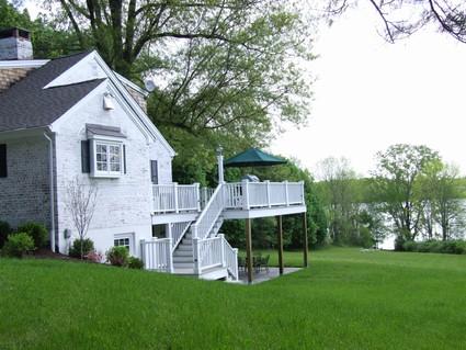 0 Withheld Road Salisbury, CT 06039 - Photo 1 of 10 a view of a house with a yard and deck