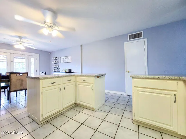 a kitchen with a cabinets and appliances