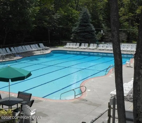 a view of outdoor space yard deck patio and swimming pool