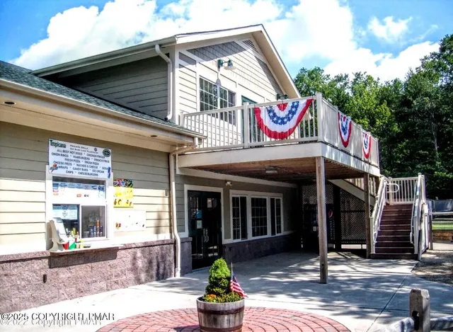 a front view of a building with street view