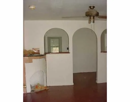 a view of livingroom with furniture and window