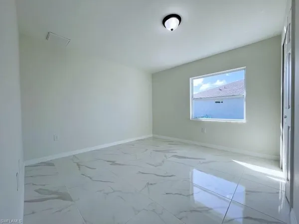 an empty room with a natural light