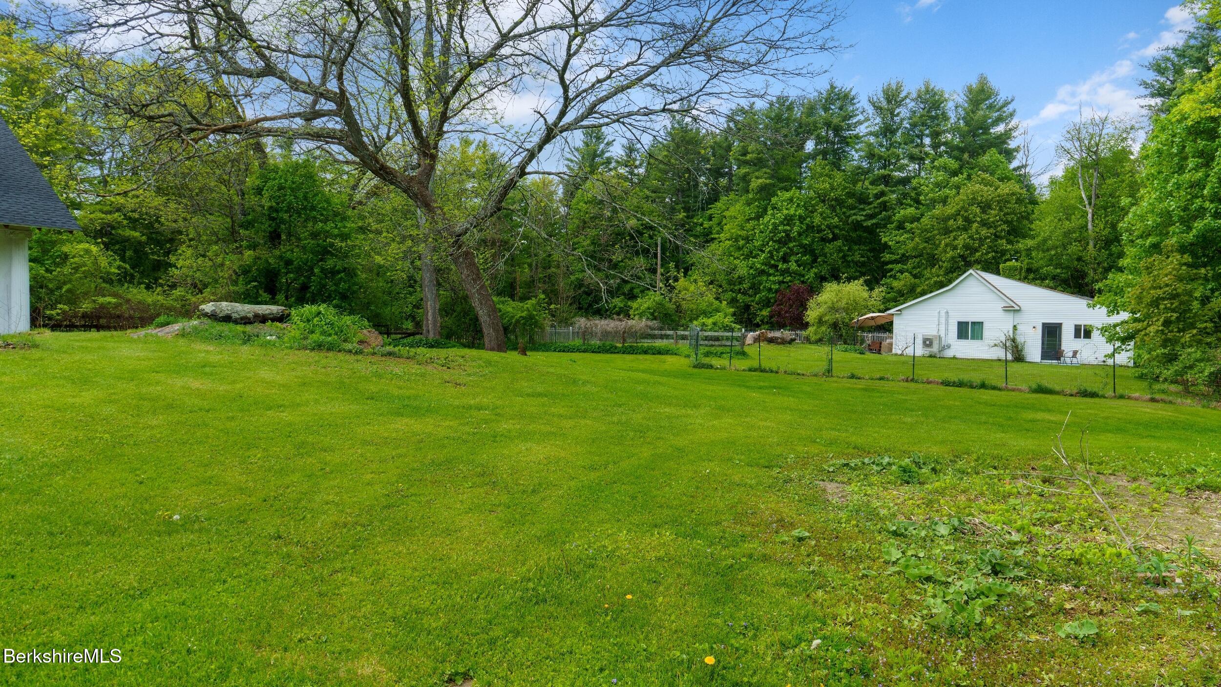 20 East Dugway Road Lenox, MA 01240 - Photo 50 of 84 a view of a house with backyard and garden