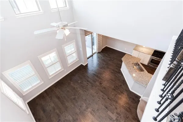 a view of an entryway with wooden floor