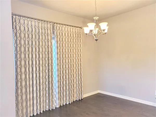 a view of a chandelier in a room