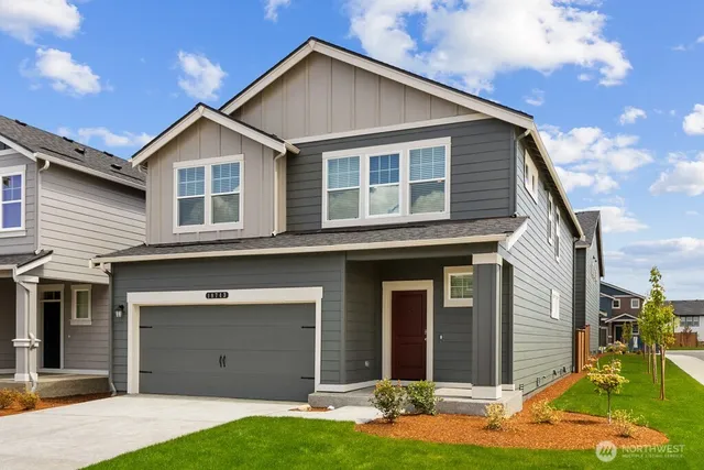 a view of a backyard of the house