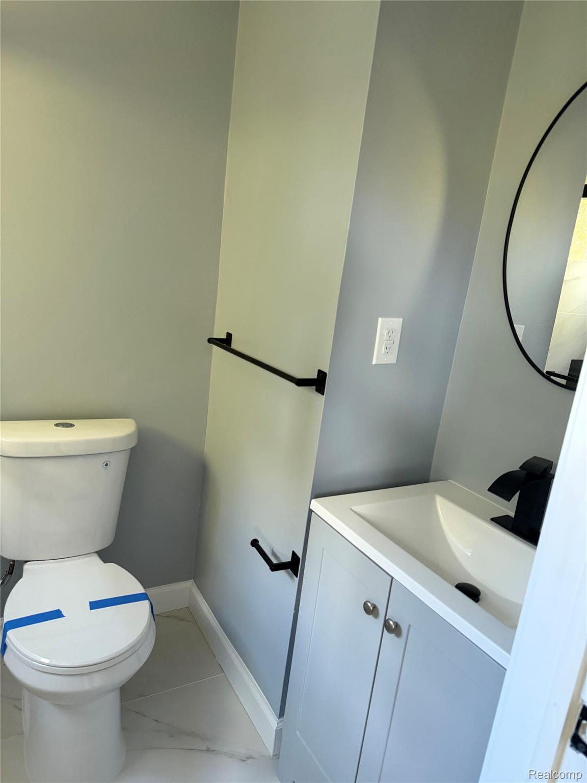 20698 Coachwood Road Riverview, MI 48193 - Photo 27 of 37 Half bath featuring vanity and baseboards