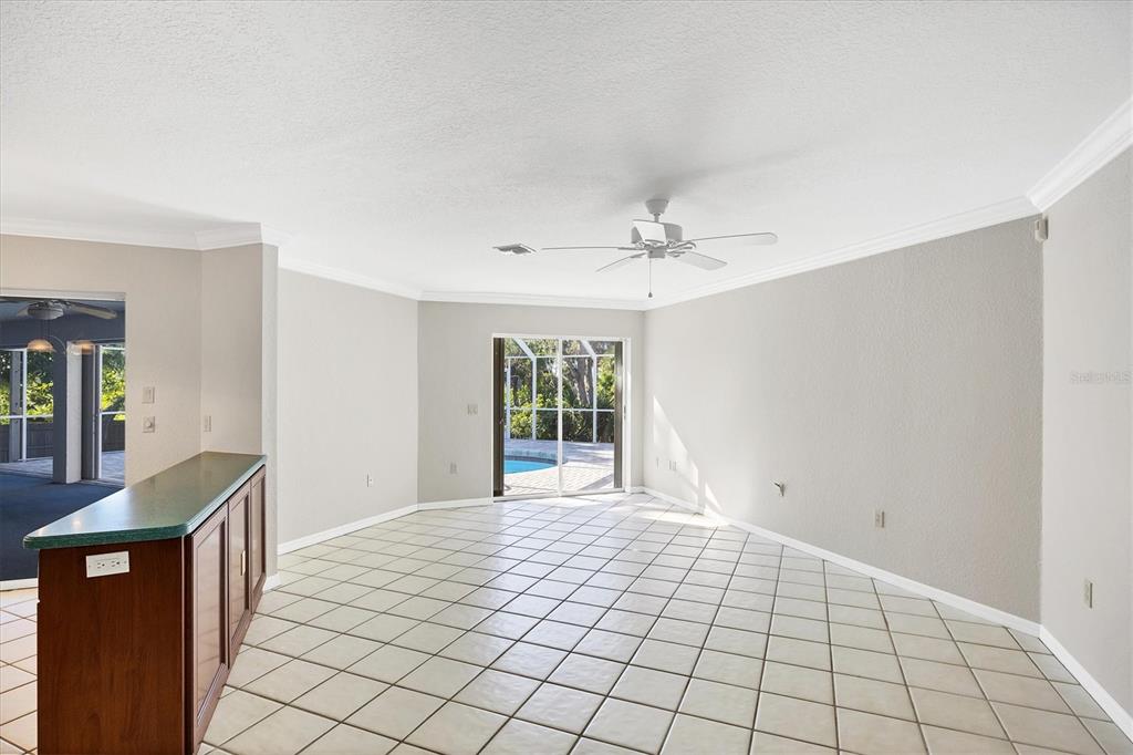 365 Capstan Drive Placida, FL 33946 - Photo 13 of 33 a view of an empty room with window and bathroom