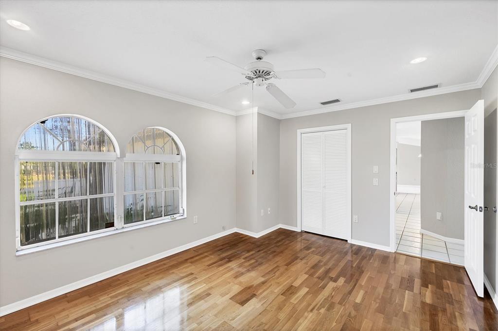365 Capstan Drive Placida, FL 33946 - Photo 20 of 33 a view of empty room with wooden floor and fan