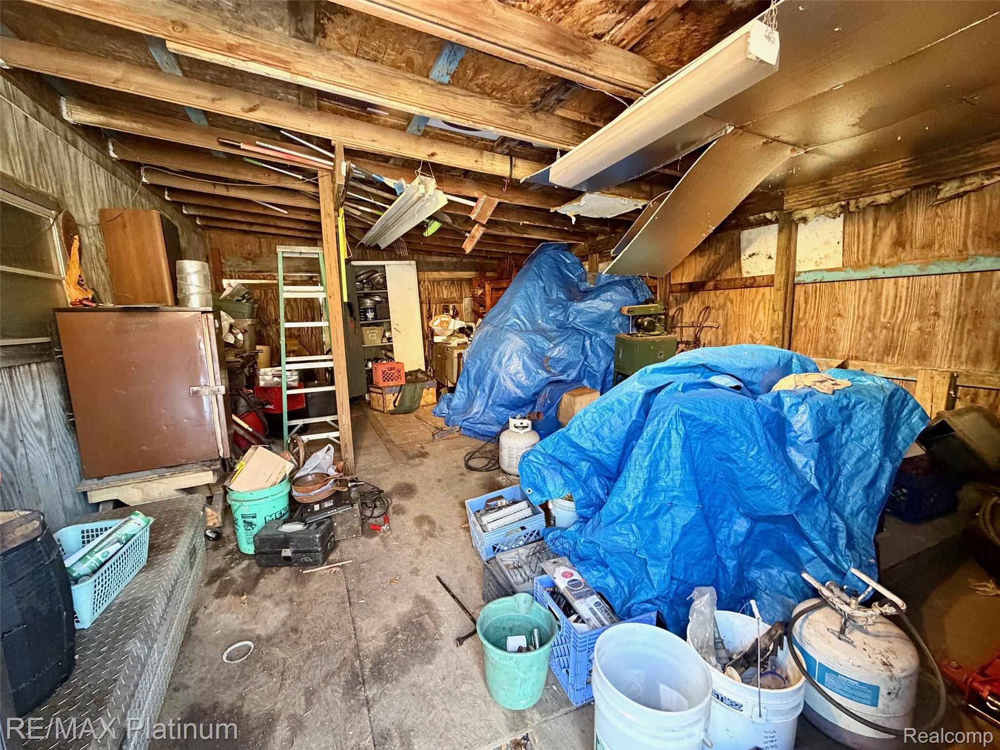6787 Coon Hill Road Munith, MI 49259 - Photo 16 of 21 Inside Pole Barn.jpeg