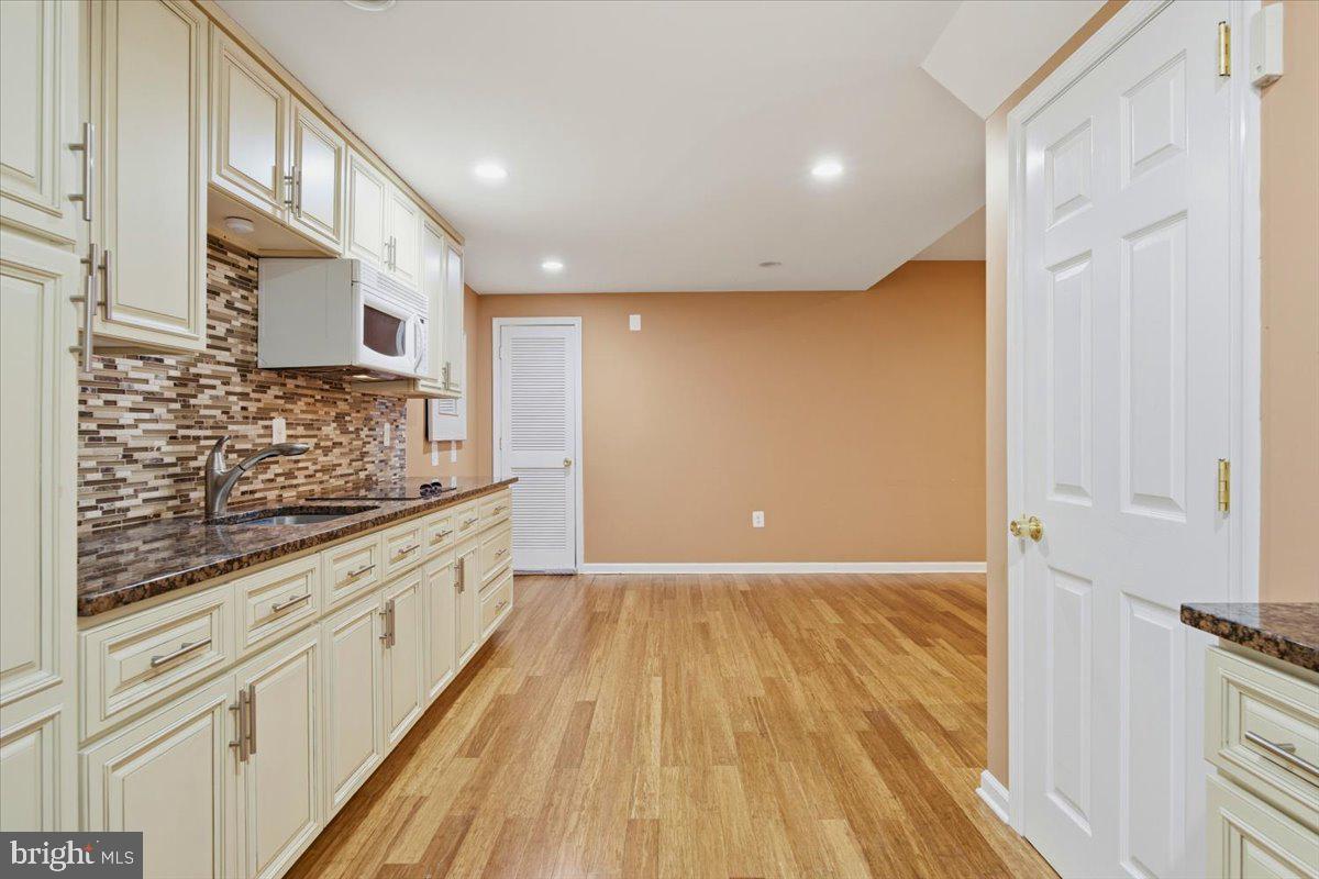 5803 Hall Street Burke, VA 22015 - Photo 59 of 77 Lower-Level Kitchen w. electric stovetop